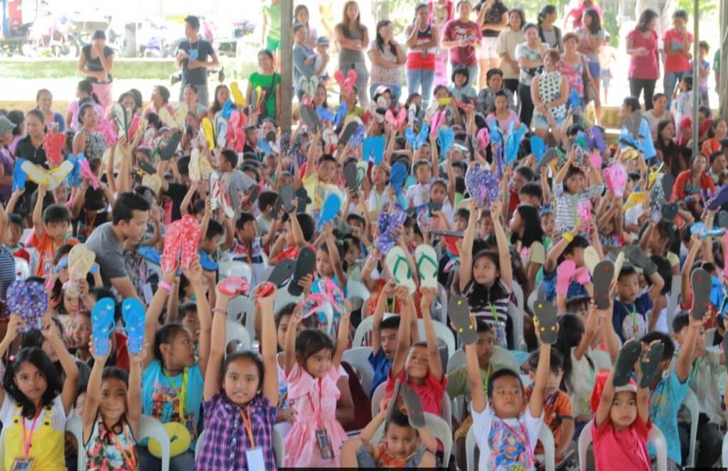 Happy Children Showing Off Gifts